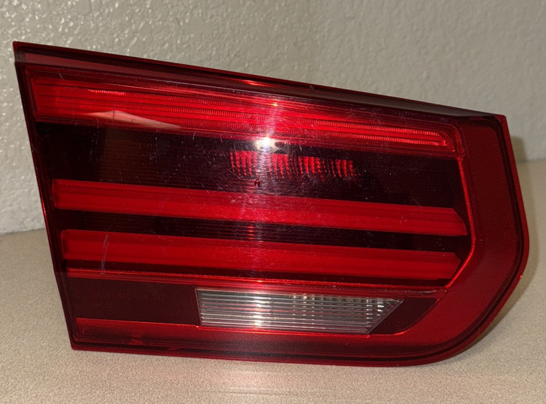 2016-2018 BMW 328i Left Inner Trunk Tail Light OEM