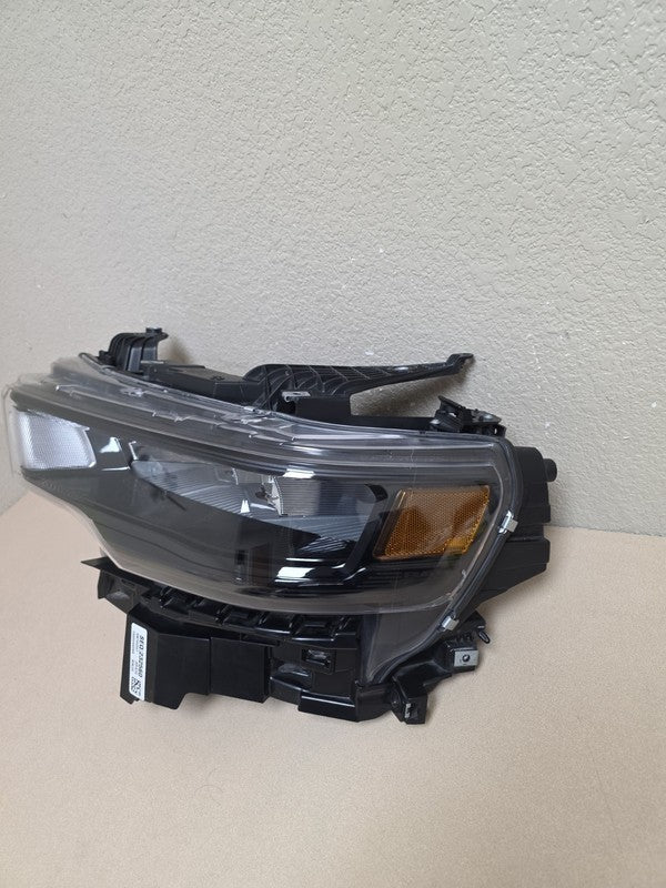 2025-2026 Dodge Ram 1500 Left Driver Side Headlight Black Trim OEM