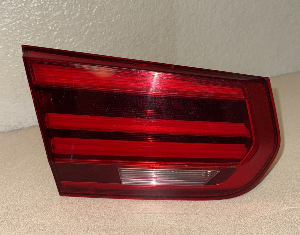 2016-2018 BMW 328i Left Inner Trunk Tail Light OEM